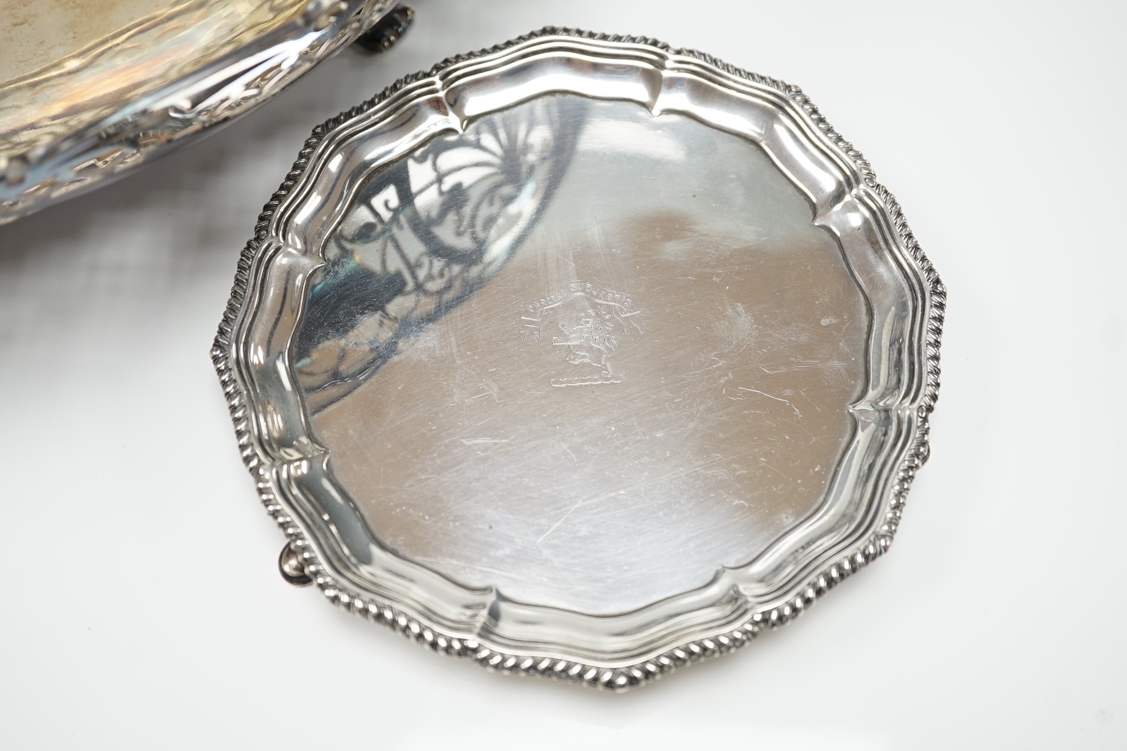 An Elizabeth II pierced silver oval fruit bowl, Poston Products Ltd, Sheffield, 1955, 28.6cm, together with a late Victorian silver waiter, London, 1898, 28.1oz.